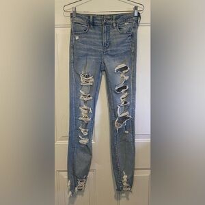 American Eagle Hi-Rise Jegging Stretch Size 4 Light Wash Distressed Holes Skinny